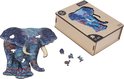 Houten puzzel van een olifant met mandala-patronen in blauwtinten, naast de open houten opbergdoos en losse stukjes.