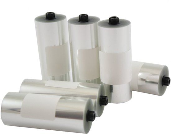 Zes Scott Prospect rollen met opgerolde film, zilverkleurig en transparant, met witte labels.