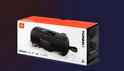 JBL Tuner 3 speaker op de doos, zwart, met oranje details, in water.