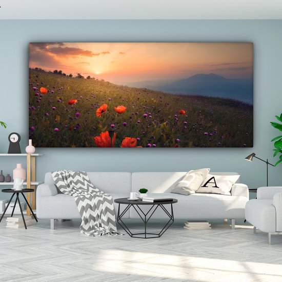 Canvas schilderij 200x100 cm - Wanddecoratie Bloemenveld - Gras - Bloemen - Planten - Zonsondergang - Oranje - Muurdecoratie woonkamer - Slaapkamer decoratie - Kamer accessoires - Schilderijen op canvas