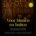 IJspegelverlichting voor binnen en buiten, met kerstboom en zittend op een bank.