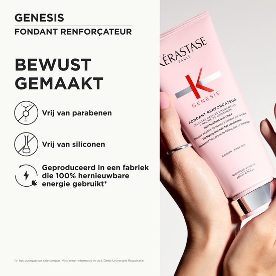 Tube de conditionneur rose Kérastase Genesis dans une main, avec le texte « Fabriqué en conscience » et des icônes pour sans parabène et sans silicone.