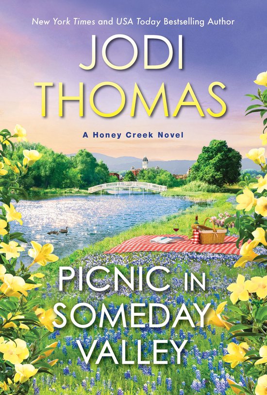 Boekomslag van 'Picnic in Someday Valley' van Jodi Thomas, een idyllisch landschap met een picknickkleed, bloemen en water.