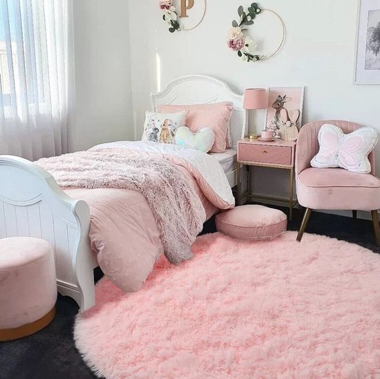 Roze rond vloerkleed van 1,2 x 1,2 m voor de slaapkamer van een ...