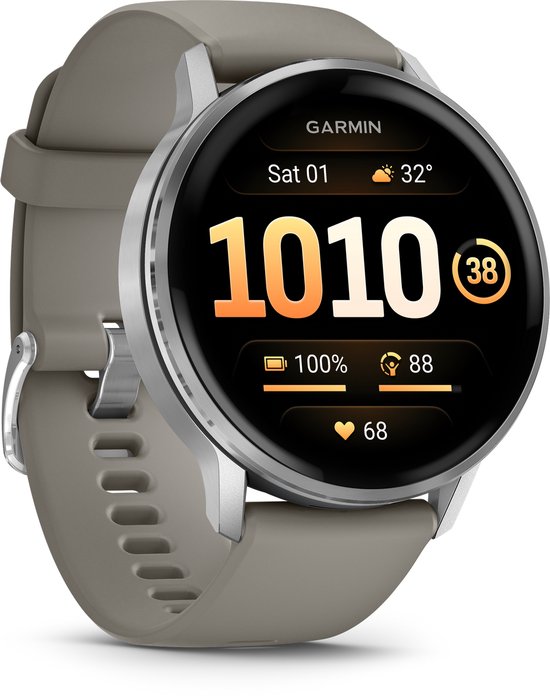 Zilverkleurig Garmin Venu 4 smartwatch met grijs bandje, scherm toont Sat 01, 32°, 1010 stappen, 38, 100% batterij, 88, 68 hartslagen.