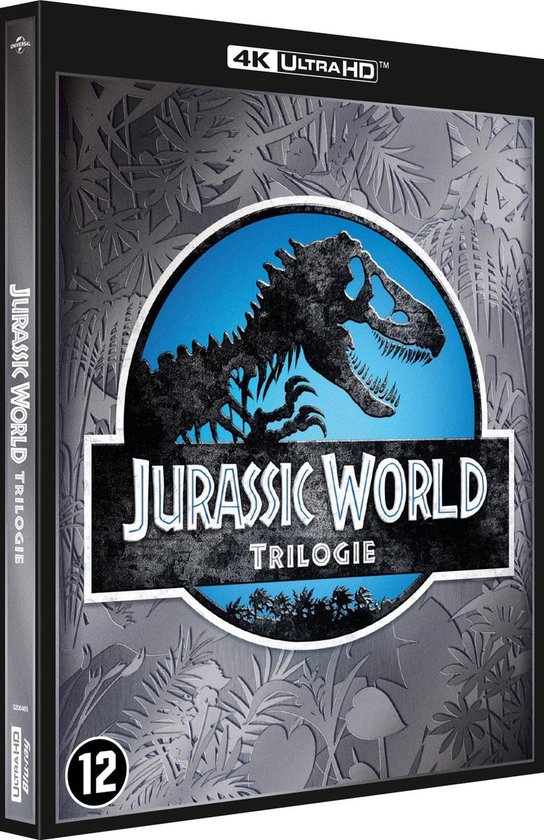 Jurassic World Trilogie 4K Ultra HD Blu-ray hoes met dinosaurus skelet logo op een grijze achtergrond met planten.