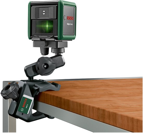 Groene Bosch laser met klem op een houten tafel.