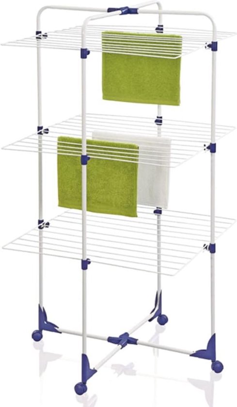 Witte droogtoren met blauwe accenten, met groene en witte handdoeken erop.