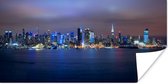 Skyline van New York bij nacht Poster 150x75 cm - Foto print op Poster (wanddecoratie woonkamer / slaapkamer) / Amerikaanse steden Poster