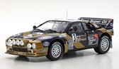 Het 1:18 Diecast-model van de Lancia 037 Grifone Esso #3 van de Rally Targa Florio van 1985. De rijders waren F. Tabaton en L. Tedeschini. De fabrikant van het schaalmodel is Kyosho. Dit model is alleen online verkrijgbaar