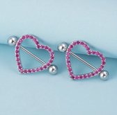 Setje tepel piercings - Hartvorming met roze steentjes