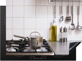 KitchenYeah® Inductie beschermer 70x52 cm - Een pan overloopt op het fornuis - Kookplaataccessoires - Afdekplaat voor kookplaat - Inductiebeschermer - Inductiemat - Inductieplaat mat