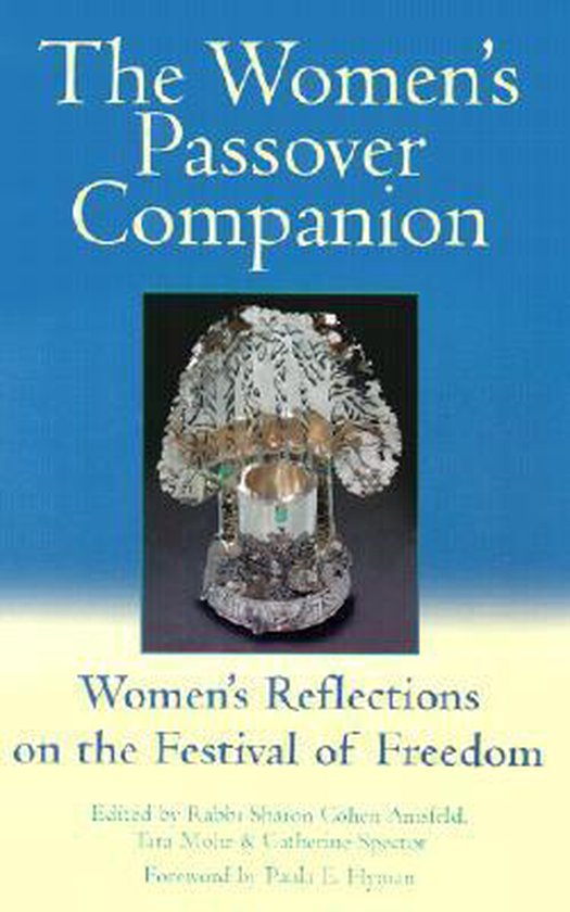 De omslag van 'The Women's Passover Companion', een boek over Joodse tradities, met een zilveren Seder schaal.