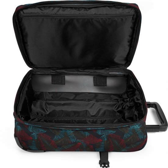 Open koffer met een tropisch bladmotief in rood en blauw.