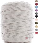Grote rol naturel macramé koord met kleurstalen aan de zijkant.
