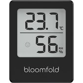 Zwarte Bloomfold hygrometer met digitaal scherm dat 23.7°C en 56% RH aangeeft met een smiley.
