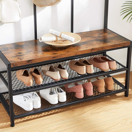Schoenenrek met bruine houten zitting en zwart metalen frame, gevuld met verschillende schoenen.