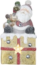 Kerstman gift LED incl. 3x LR44 batterijen rood 20x17xH38 cm Polyresin