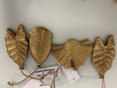 Vier decoratieve bladeren