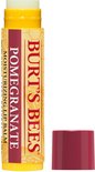 Burt's Bees lippenbalsem met granaatappelgeur. Geel met rood-bruine opdruk. Dopje ernaast.