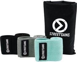 StreetGains Stoffen Weerstandsbanden Set - 3 Stuks - Ideaal voor Been Training - Booty Bands - Mini Bands - Antislip Rubberen Laag om Verschuiven te Voorkomen - Verschillende Weerstandsniveaus - Inclusief Draagtas & Trainingsgids - Fitness Banden