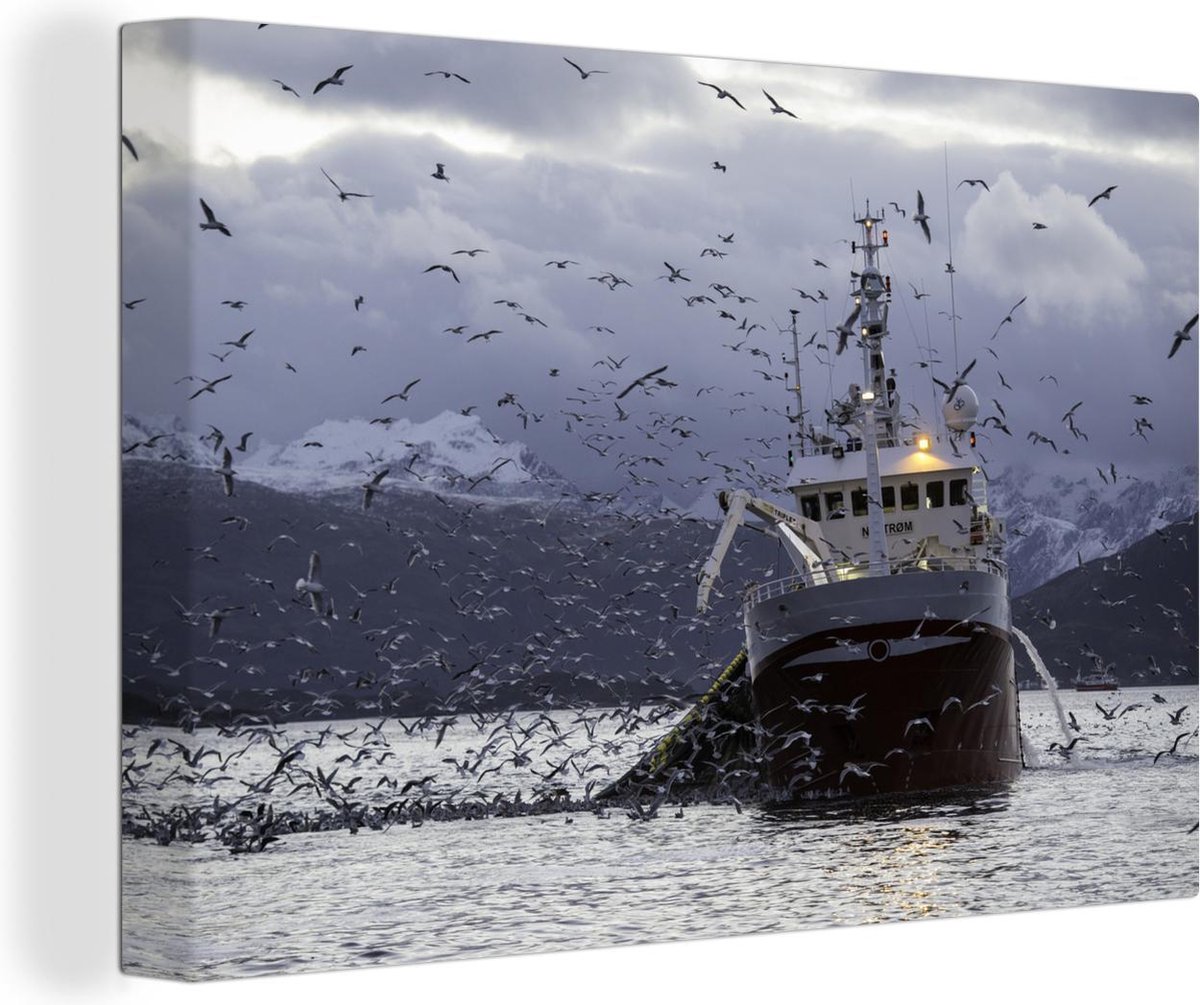 Tableau sur toile Pêcheur avec de pêche et la capture de poissons