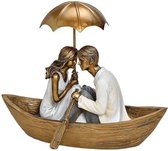 Romantische paar in boot - beeld - goud