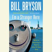 Boekomslag van "I'm a Stranger Here Myself" door Bill Bryson, met een view-master en het Vrijheidsbeeld op de achtergrond.