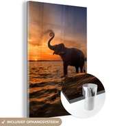 MuchoWow - Glasschilderij - Acrylglas - Olifant - Zonsondergang - Water - Muurdecoratie - 40x60 cm - Foto op glas - Wanddecoratie