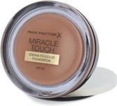 Max Factor Miracle Touch Cream-To-Liquid Foundation - 085 Caramel