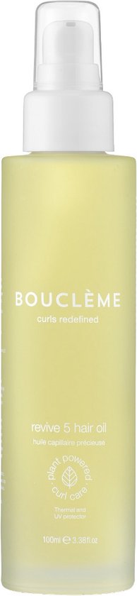 Gele fles met witte pomp, met het label 'BOUCLÈME curls redefined revive 5 hair oil'.