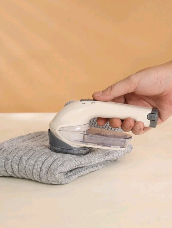 Elektrisch pluisscheerapparaat ﻿ Draagbare elektrische kleding pluisjespillen verwijderaars willekeurige kleur kleding pluispellets gesneden machine stof trui pillen scheerapparaat Trui-scheerapparaat