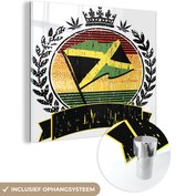 MuchoWow® Glasschilderij 20x20 cm - Schilderij acrylglas - Een reggae embleem met de vlag van Jamaica - Foto op glas - Schilderijen