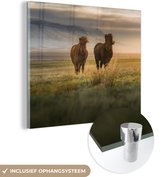 MuchoWow® Glasschilderij 90x90 cm - Schilderij acrylglas - Paarden - Lucht - Gras - Foto op glas - Schilderijen