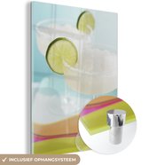 MuchoWow® Glasschilderij 90x120 cm - Schilderij acrylglas - Kleurrijke cocktail met limoen - Foto op glas - Schilderijen