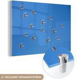 MuchoWow® Peinture sur verre 150x100 cm - Peinture sur verre - Beaucoup d'oies dans les airs - Photo sur verre acrylique - Peintures
