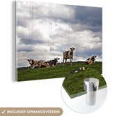 MuchoWow® Glasschilderij 150x100 cm - Schilderij acrylglas - Koeien - Weide - Wolken - Foto op glas - Schilderijen