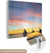 MuchoWow® Glasschilderij 20x20 cm - Schilderij acrylglas - Silhouetten van zeilboten bij het strand van Boracay - Foto op glas - Schilderijen
