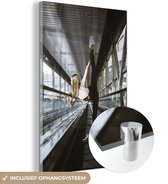 MuchoWow® Glasschilderij 120x180 cm - Schilderij acrylglas - Vrouw die ballet doet op een roltrap - Foto op glas - Schilderijen