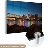 MuchoWow® Glasschilderij 180x120 cm - Schilderij acrylglas - Skyline van Cincinnati in Amerika verlicht in de nacht - Foto op glas - Schilderijen
