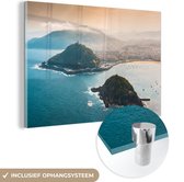 MuchoWow® Glasschilderij 120x80 cm - Schilderij acrylglas - Een eiland voor de kust van Spanje - Foto op glas - Schilderijen
