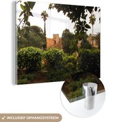 MuchoWow® Glasschilderij 40x30 cm - Schilderij acrylglas - De groene tuinen in de Marokkaanse stad Rabat - Foto op glas - Schilderijen