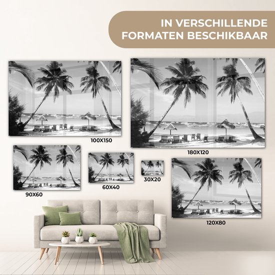 MuchoWow® Glasschilderij 150x100 cm - Schilderij acrylglas - Palmbomen en ligstoelen op het strand van Boracay - zwart wit - Foto op glas - Schilderijen