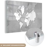 MuchoWow® Glasschilderij 150x100 cm - Schilderij acrylglas - Ronde en witte wereldkaart op een grijze achtergrond - zwart wit - Foto op glas - Schilderijen