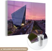 MuchoWow® Glasschilderij 120x80 cm - Schilderij acrylglas - Den Haag -Skyline - Lucht - Foto op glas - Schilderijen