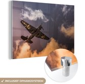 MuchoWow® Glasschilderij 150x100 cm - Schilderij acrylglas - Vliegtuig - Vliegen - Lucht - Foto op glas - Schilderijen