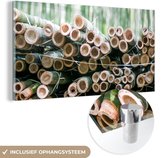 MuchoWow® Glasschilderij 160x80 cm - Schilderij acrylglas - Stapel gesneden bamboe Arashiyama - Foto op glas - Schilderijen