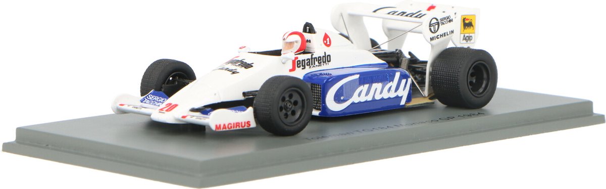 De 1:43 Diecast Modelcar van de Toleman TG184 #20 van de GP van Monaco van 1984. De coureur was J. Cecotto. De fabrikant van het schaalmodel is Spark. Dit artikel is alleen online beschikbaar.