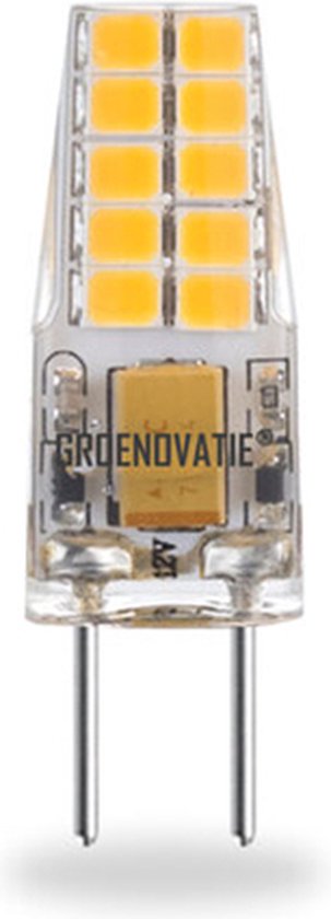 Warm witte LED lamp met zilveren pinnen en een groen logo op de basis.