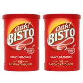 Twee rode blikken Bisto Gravy Granules met de tekst "aah! BISTO", "JUST ADD BOILING WATER", "GRAVY GRANULES", "ESTD. THE 1908", "NATION'S FAVOURITE".